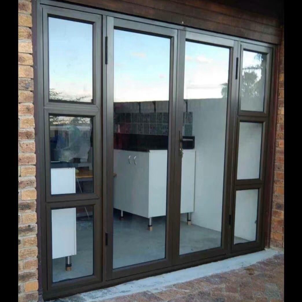 Dark aluminium framed glass door installation